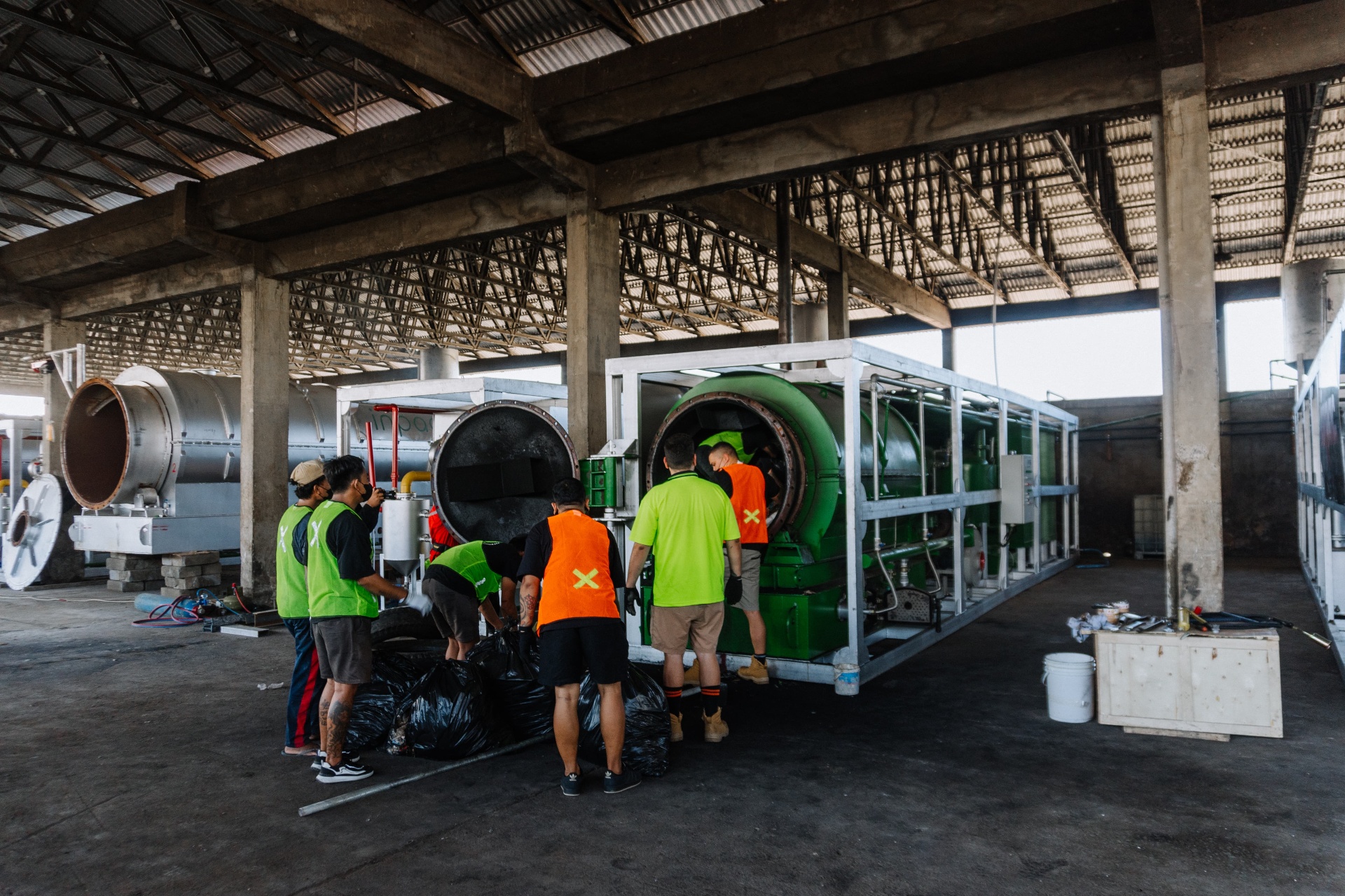 INPAC team loading the pyrolysis reactor